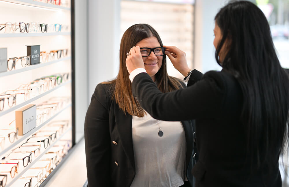 Customer receiving a test fit for prescription glasses frames as Eyes In Essendon, a boutique optometrist in Melbourne